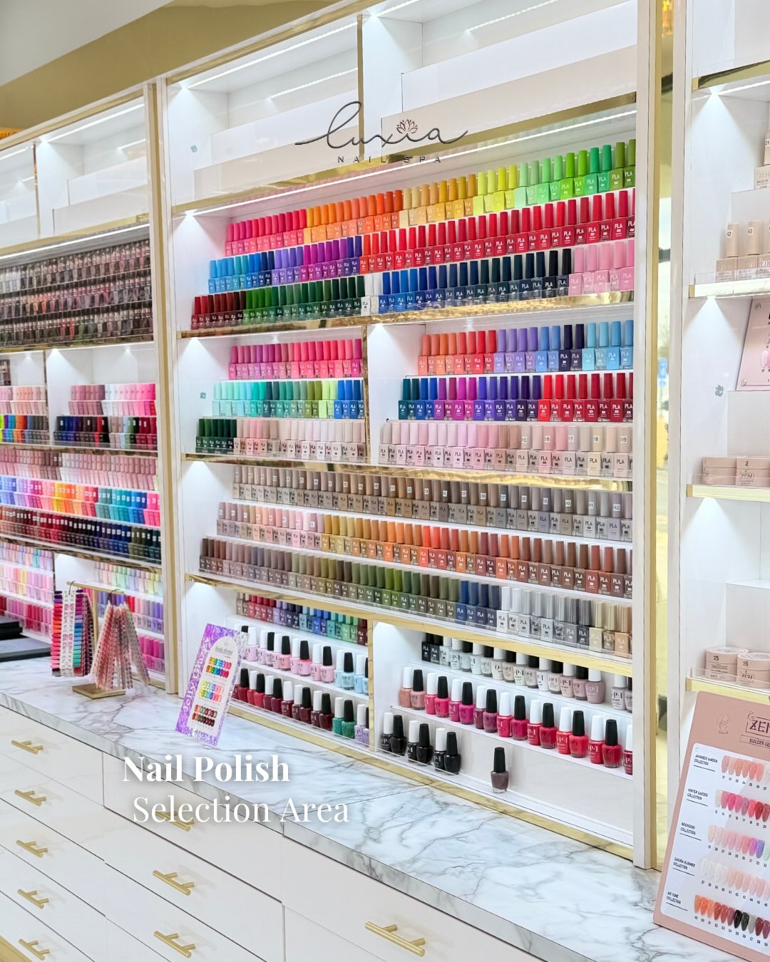 Extensive nail polish selection wall with hundreds of colors